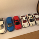 Scale comparison: Majorette is 1:55, Tomica is 1:61. All HW unlisted.
